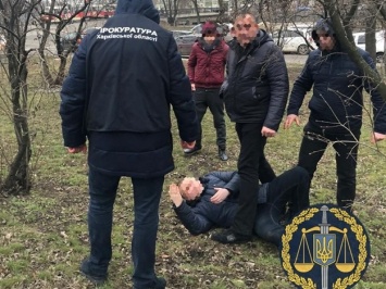 Погоня и деньги в окно: в центре Харькова ловили подполковника полиции