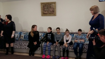 Министр приехала в Мелитополь, чтобы посмотреть, как живут сироты и многодетные