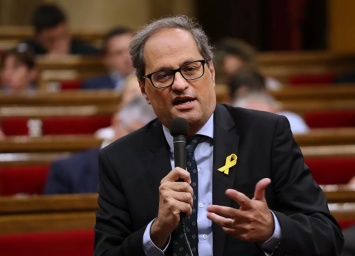 Главу правительства Каталонии, который выступает за независимость, лишили депутатского мандата