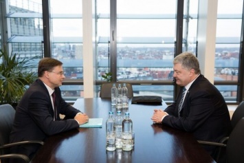 Говорили об интеграции с ЕС и санкциях против России: Порошенко встретился с вице-президентом Еврокомиссии