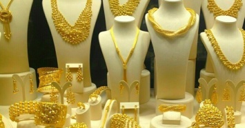 Золотые слитки и ювелирные украшения пугают покупателей своей ценой - отчет