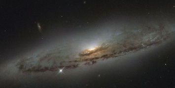 Впервые ученые обнаружили чудовищную мертвую галактику