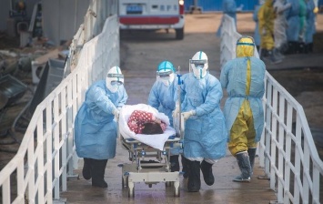 Коронавирус в Китае: закрытые города и более 70 тыс. инфицированных