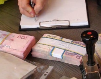 В Киеве экс-сотрудника "Приватбанка" подозревают в подделке "весом" 80 млн