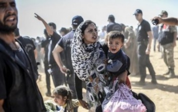Турция открыла границы в Европу для сирийских беженцев, - Reuters