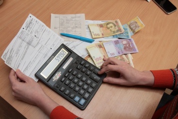 Украинцы продолжают сокращать долги за коммуналку