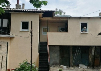 Коммунальщики отремонтировали дом на Молдаванке, пострадавший во время февральского шторма