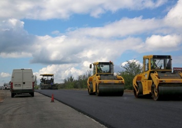 Турецкая компания "Onur" продолжает ремонтировать дорогу Запорожье-Васильевка-Бердянск (фото, видео)