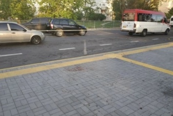 В Николаеве произошла перестрелка на остановке: есть пострадавшие. Фото 18+