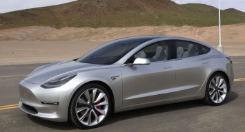 Tesla добавила беспроводную зарядку телефонов в электромобили Model 3