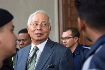 Бывшего премьера Малайзии признали виновным в хищении миллионов долларов