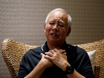 Бывший премьер Малайзии приговорен к 12 годам заключения