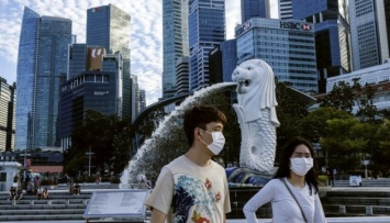 В Сингапуре приезжим будут одевать "карантинный" браслет