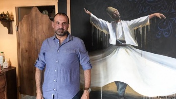 "Я справился!": как сирийский беженец стал ресторатором в Берлине