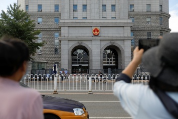 В КНР бизнесмен, критиковавший власти, приговорен к 18 годам тюрьмы
