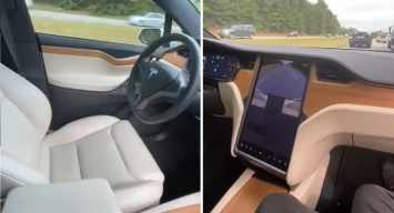 Водитель Tesla бросил руль и сел на пассажирское сиденье (ВИДЕО)