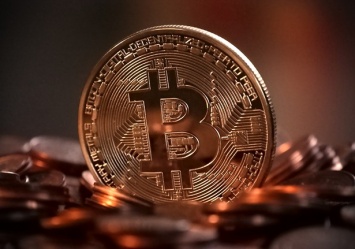 Bitcoin вновь преодолел важную для себя отметку в $12 000