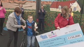 Британский мальчик с церебральным параличом прошел два марафона и собрал 150 тысяч фунтов