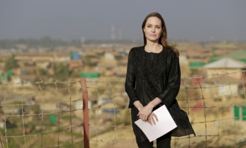 Анджелина Джоли и Том Харди снимут байопик о военном фотографе Доне Маккаллине