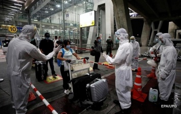 В аэропорту Шанхая были отменены все рейсы после COVID-19 у грузчиков
