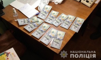 В Киевской области полиция задержала главу ВВК, требовавшего от призывника тысячу долларов за уклонение от армии