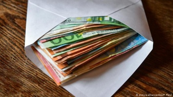Коррупция в Германии: дающих взятки все больше, мздоимцев все меньше