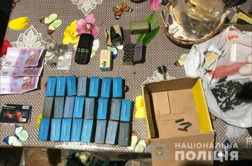 В Запорожье у подозреваемого в наркоторговле дома нашли 1385 патронов, - ФОТО