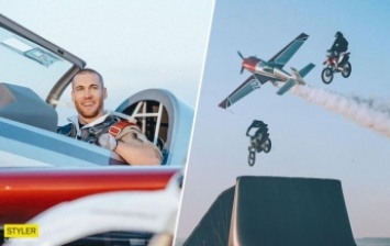 Над самолетом летали мотоциклы: украинский пилот показал невероятный трюк в небе (видео)