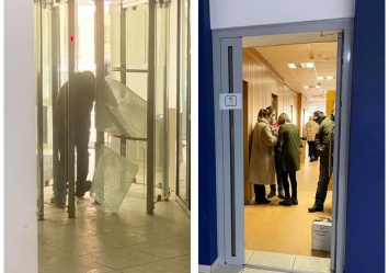 Перестарались: бойцы СБУ ворвались в здание "Киевводоканала" и разбили стеклянные двери
