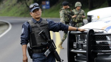 В Мексике банда боевиков зверски расправилась с полицией (фото)