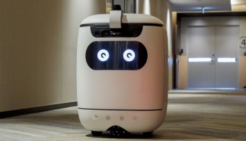В Японии тестируют робота-курьера, который сам ездит в лифте