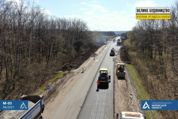 На харьковской окружной заасфальтировали 16 км дороги (фото)