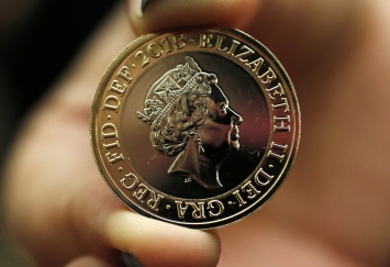 Результат выборов в английском городе определен с помощью броска монеты