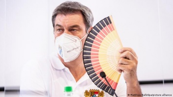 Как немецкие политики спасаются от жары (фото)