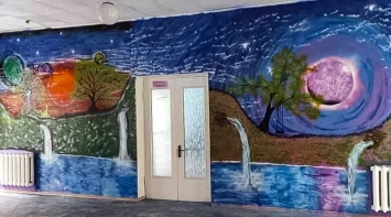 Каховский художник разрисовал стену в детском доме