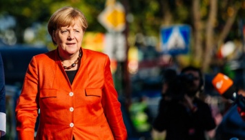 Меркель полетела в США, где обсудит урегулирование на востоке Украины и Nord Stream 2