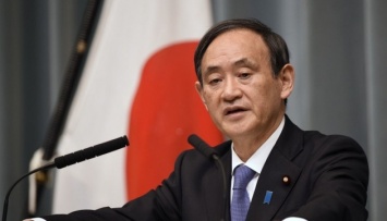 Премьер Японии отказался идти на выборы главы правящей партии