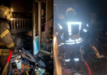 В огненной ловушке: спасатели достали двух людей из пожара на Троещине