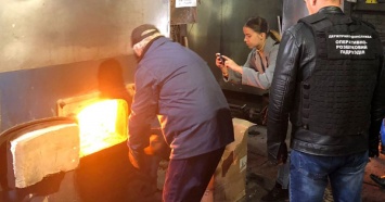В Ровно показательно сожгли 15 тыс. пачек белорусских сигарет