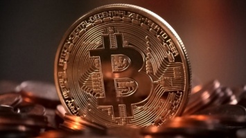 Стоимость Bitcoin впервые за месяц превысила 50 тысяч долларов