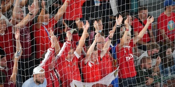 Российских футбольных фанатов избили после матча со Словенией