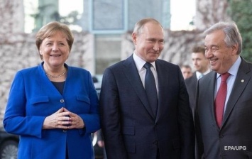 Путин обратился к Меркель и Шольцу