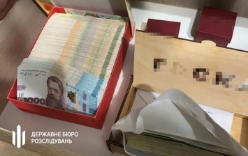 В Киеве полицейский и медик организовали схему подделки COVID-сертификатов