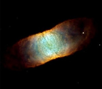 Телескоп Hubble сфотографировал туманность Сетчатка, которая похожа на пончик