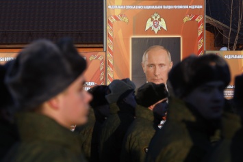 ЕСПЧ присудил €12,4 тысяч активисту, плюнувшему в портрет Путина